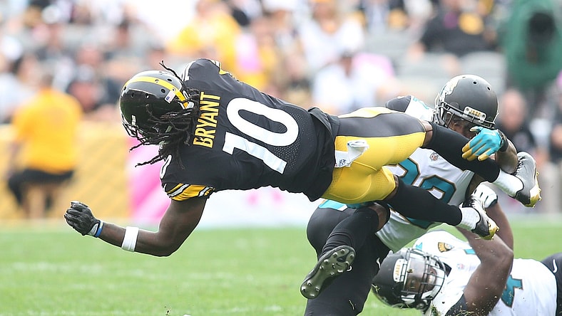 Pittsburgh Steelers wide receiver Martavis Bryant (10) is tackled after a catch by Jacksonville Jaguars cornerback Aaron Colvin (22) during the second quarter at Heinz Field. Jacksonville won 30-9.