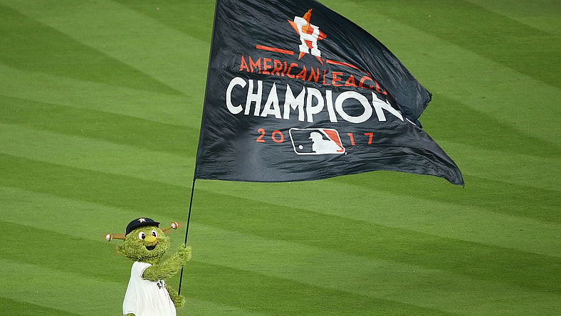 Houston Astros mascot Orbit waives flag after ALCS Game 7