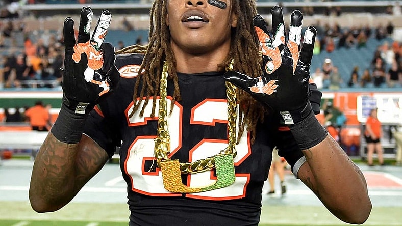 Sheldrick Redwine with Miami turnover chain