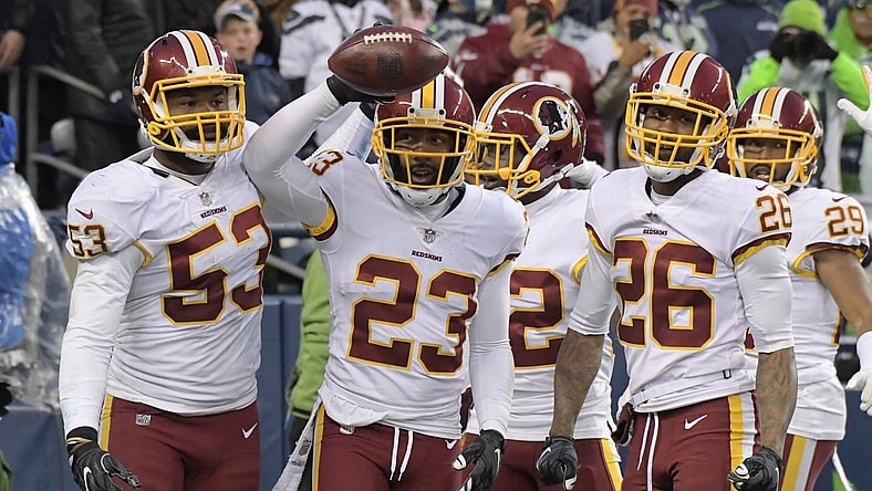 Redskins celebrate an interception against the Seahawks in NFL Week 9