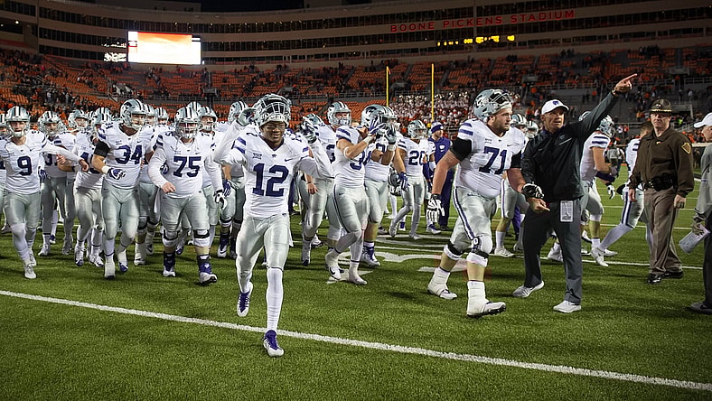Kansas State Wildcats celebrate after beating the Oklahoma State Cowboys in college football Week 12