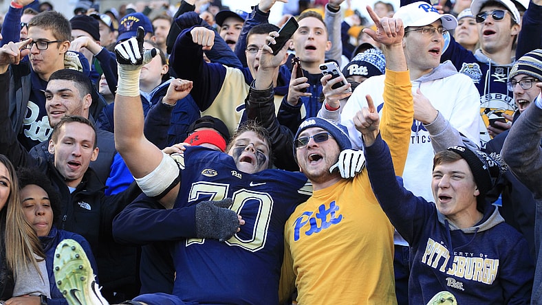 Pitt fans celebrate after the Panthers beat Miami on Black Friday