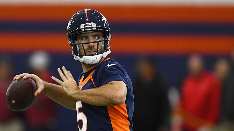 Joe Flacco throwing a pass as a member of the Denver Broncos