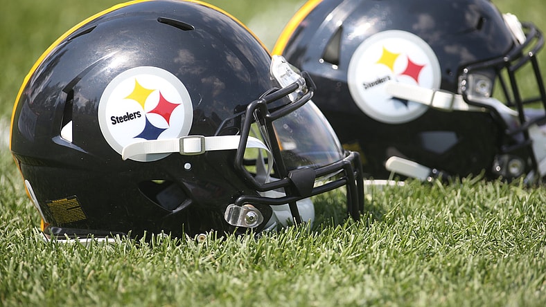 Pittsburgh Steelers helmets on the field during training camp.