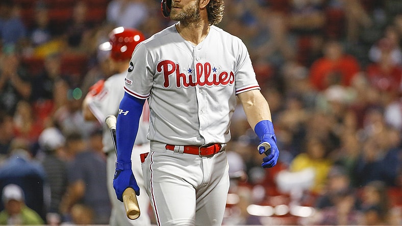 Bryce Harper reacts after striking out