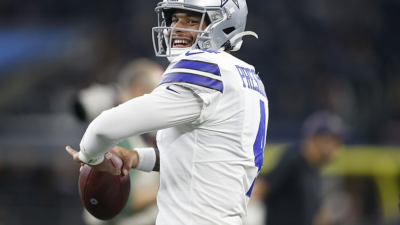 Dak Prescott throws pass before NFL game