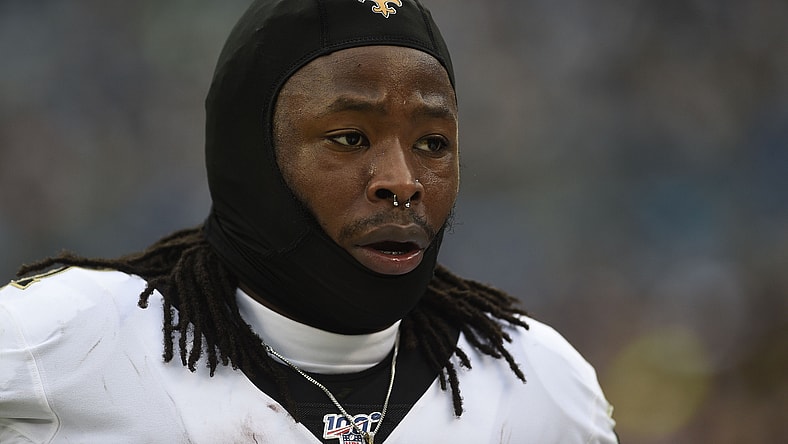 Saints RB Alvin Kamara on sideline against the Panthers.