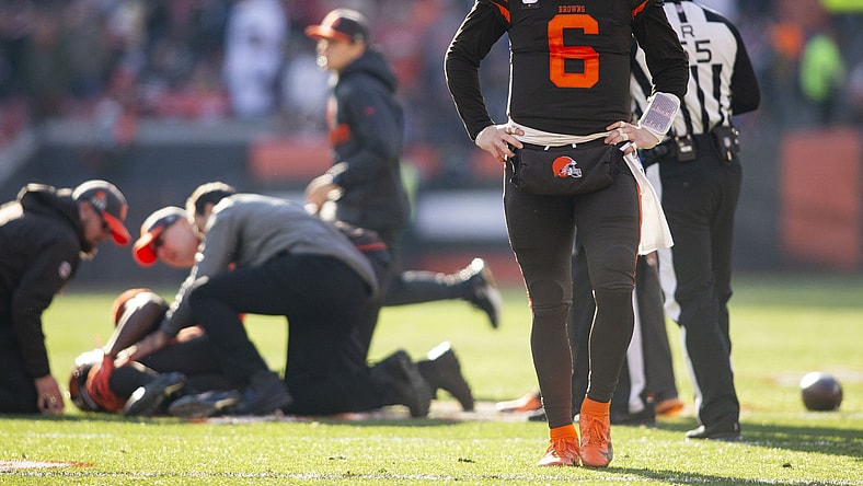 Cleveland Browns quarterback Baker Mayfield walks away following an injury.