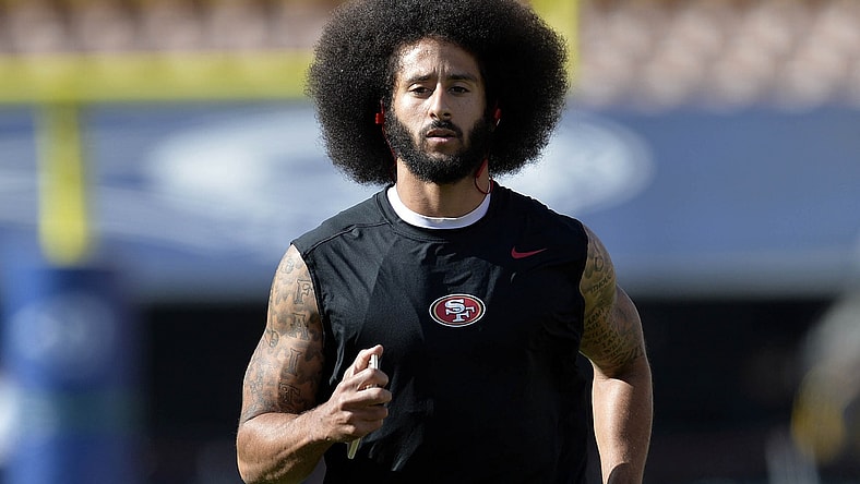 NFL QB Colin Kaepernick warms up