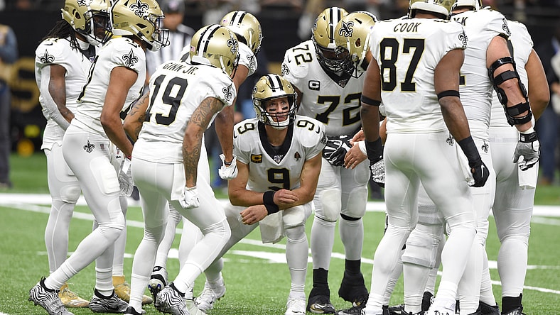 New Orleans Saints quarterback Drew Brees with his teammates