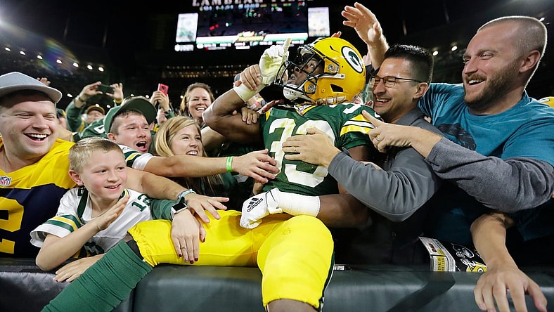 Green Bay Packers RB Aaron Jones leaps at Lambeau Field