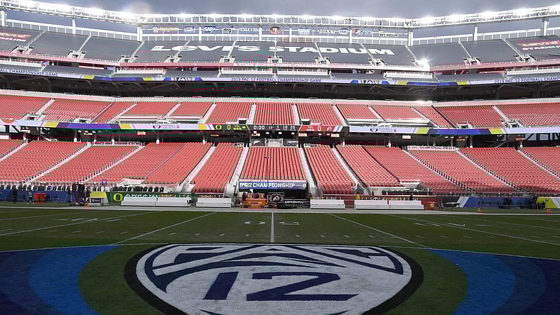 Pac 12 Conference logo on football field