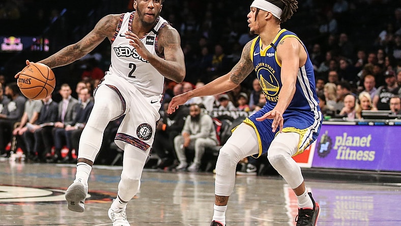 Nets' Taurean Prince drives against Warriors Damian Lee