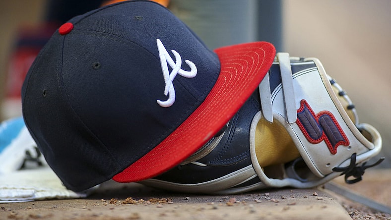 Atlanta Braves hat and glove during MLB season