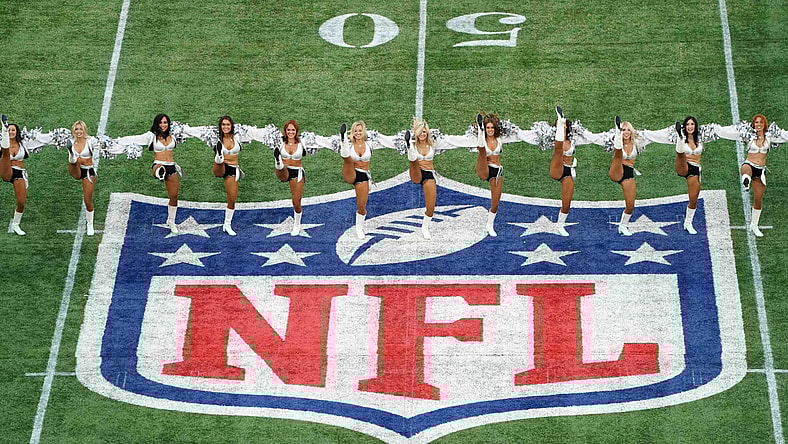 Raiders cheerleaders during NFL game in London.