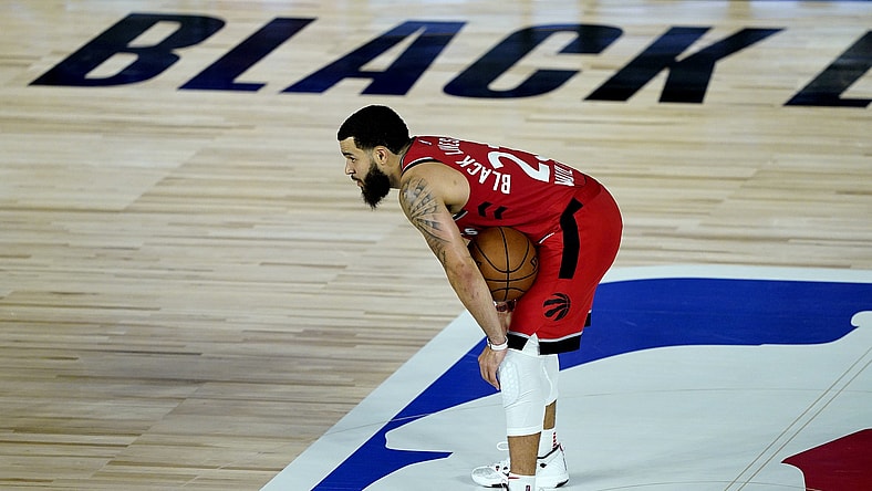 Raptors Fred VanVleet against Heat during NBA game.