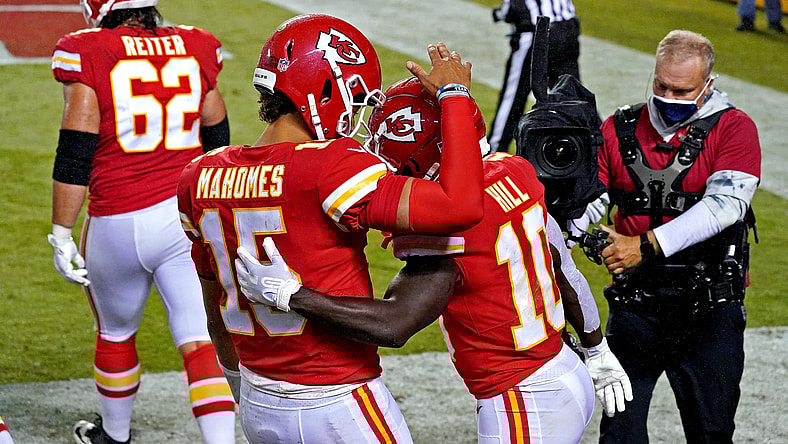 Sep 10, 2020; Kansas City, Missouri, USA; Kansas City Chiefs wide receiver Tyreek Hill (10) celebrates with quarterback Patrick Mahomes (15) after scoring a touchdown during the second half against the Houston Texans at Arrowhead Stadium. Mandatory Credit: Denny Medley-USA TODAY Sports