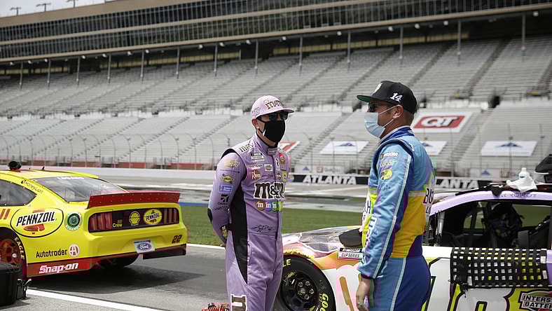 Clint Bowyer and Kyle Busch ahead of NASCAR race