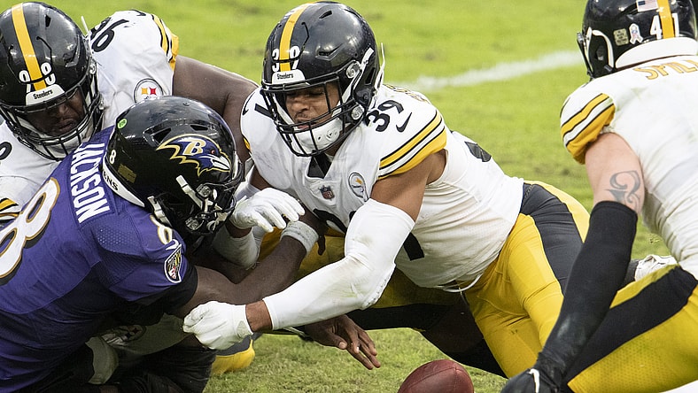 Nov 1, 2020; Baltimore, Maryland, USA; Pittsburgh Steelers free safety Minkah Fitzpatrick (39) hits Baltimore Ravens quarterback Lamar Jackson (8) as the ball hits the ground fourth quarter at M&T Bank Stadium. Mandatory Credit: Tommy Gilligan-USA TODAY Sports