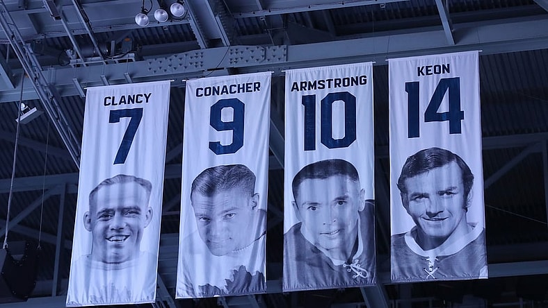 Nov 25, 2017; Toronto, Ontario, CAN; The honored numbers of former Toronto Maple Leafs players King Clancy (7) and Charlie Conacher (9) and George Armstrong (10) and Dave Keon (14) hang from the rafters before the start of the game against the Washington Capitals at Air Canada Centre. The Capitals beat the Maple Leafs 4-2. Mandatory Credit: Tom Szczerbowski-USA TODAY Sports
