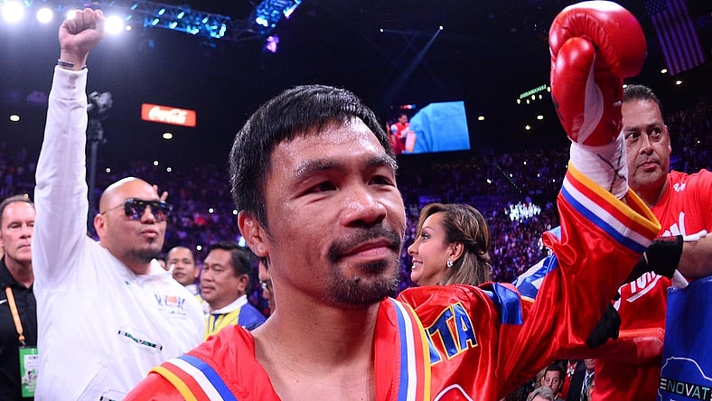 Jul 20, 2019; Las Vegas, NV, USA; Manny Pacquiao enters the ring to face Keith Thurman (not pictured) for their WBA welterweight championship bout at MGM Grand Garden Arena. Pacquiao won via split decision. Mandatory Credit: Joe Camporeale-USA TODAY Sports