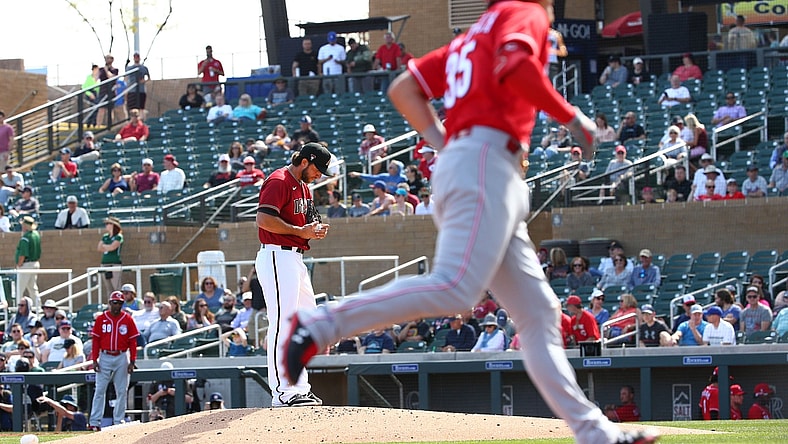 Feb 27, 2020; Scottsdale, AZ, USA; Arizona Diamondbacks pitcher Madison Bumgarner reacts after giving-up a home run to Cincinnati Reds Derek Dietrich (35) in the second inning during a Cactus League game on Feb. 27, 2020 at Salt River Fields at Talking Stick in Scottsdale, Ariz.   Mandatory Credit: Rob Schumacher/Arizona Republic via USA TODAY NETWORK