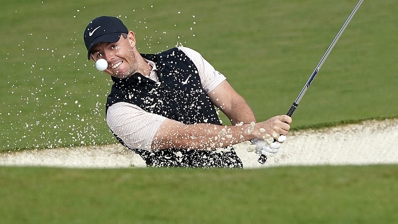 Nov 15, 2020; Augusta, Georgia, USA; Rory McIlroy plays a shot from a bunker on the second hole during the final round of The Masters golf tournament at Augusta National GC. Mandatory Credit: Michael Madrid-USA TODAY Sports