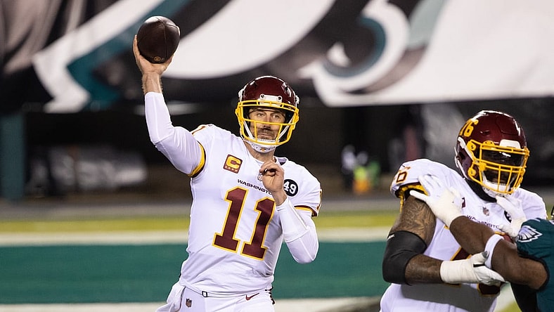 Jan 3, 2021; Philadelphia, Pennsylvania, USA; Washington Football Team quarterback Alex Smith (11) passes the ball against the Philadelphia Eagles during the first quarter at Lincoln Financial Field. Mandatory Credit: Bill Streicher-USA TODAY Sports