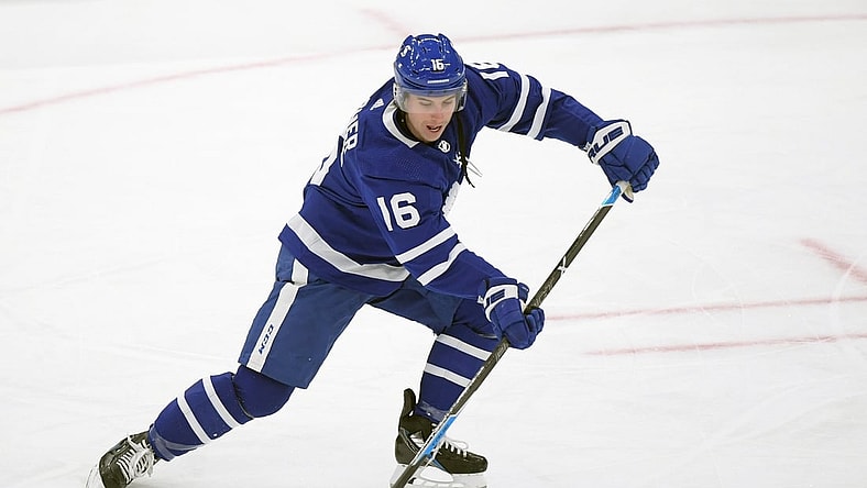 Jan 20, 2021; Toronto, Ontario, CAN; Toronto Maple Leafs forward Mitchell Marner (16) passes the puck during warmup before playing Edmonton Oilers at Scotiabank Arena. Mandatory Credit: Dan Hamilton-USA TODAY Sports