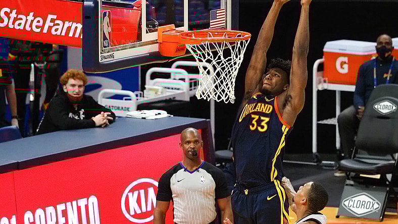 Jan 20, 2021; San Francisco, California, USA; Golden State Warriors center James Wiseman (33) goes up for a dunk against the San Antonio Spurs during the third quarter at Chase Center. Mandatory Credit: Kelley L Cox-USA TODAY Sports