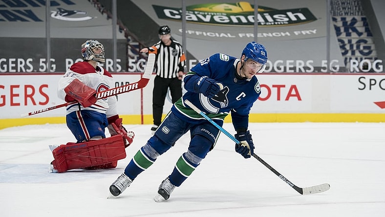 Jan 20, 2021; Vancouver, British Columbia, CAN; Vancouver Canucks forward Bo Horvat (53) scores on Montreal Canadiens goalie Carey Price (31) in the shootout during a game at Rogers Arena. Vancouver won in a shootout after overtime ended tied 5-5.  Mandatory Credit: Bob Frid-USA TODAY Sports