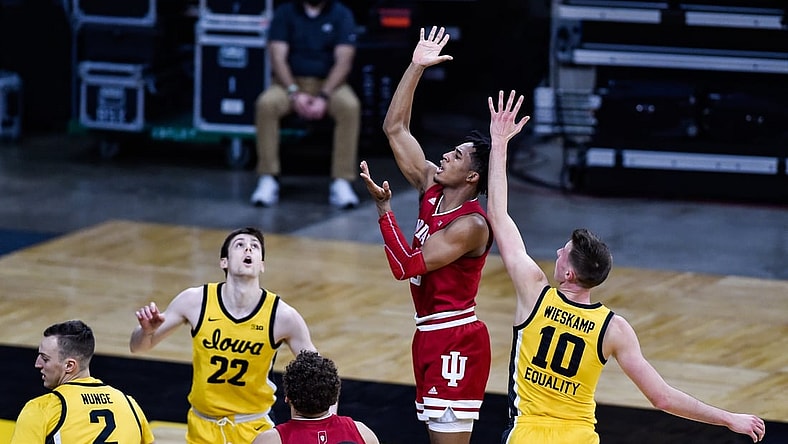 Jan 21, 2021; Iowa City, Iowa, USA; Indiana Hoosiers guard Armaan Franklin (2) shoots the ball as Iowa Hawkeyes guard Joe Wieskamp (10) and forward Patrick McCaffery (22) look on during the first half at Carver-Hawkeye Arena. Mandatory Credit: Jeffrey Becker-USA TODAY Sports