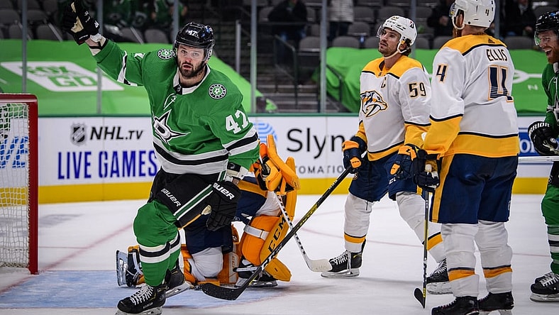 Jan 22, 2021; Dallas, Texas, USA; Dallas Stars right wing Alexander Radulov (47) celebrates scoring a goal against Nashville Predators goaltender Juuse Saros (74) as defenseman Ryan Ellis (4) and defenseman Roman Josi (59) look on during the second period at the American Airlines Center. Mandatory Credit: Jerome Miron-USA TODAY Sports