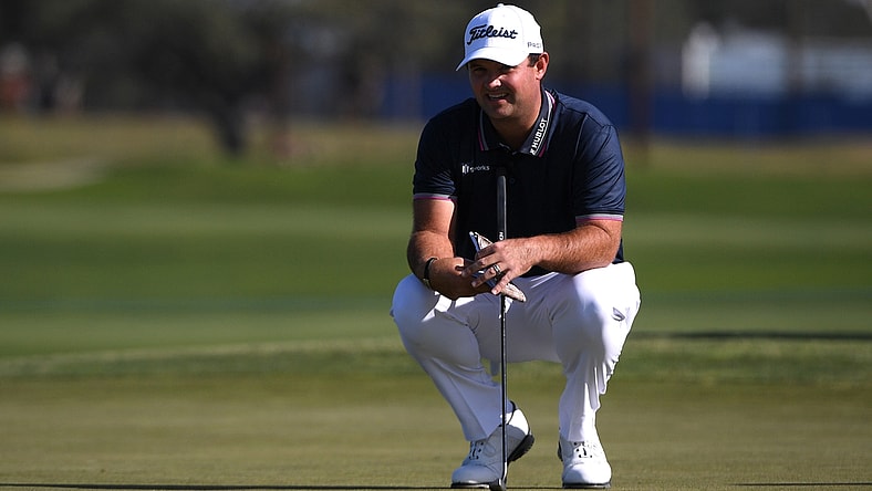 Jan 28, 2021; San Diego, California, USA; Patrick Reed lines up a putt on the 11th green during the first round of the Farmers Insurance Open golf tournament at Torrey Pines Municipal Golf North Course. Mandatory Credit: Orlando Ramirez-USA TODAY Sports