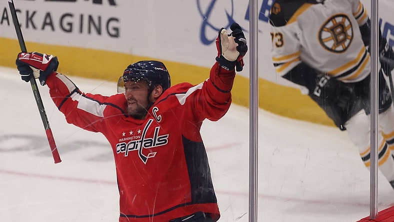 Jan 30, 2021; Washington, District of Columbia, USA; Washington Capitals left wing Alex Ovechkin (8) celebrates after scoring the game winning goal in overtime against the Boston Bruins at Capital One Arena. Mandatory Credit: Geoff Burke-USA TODAY Sports