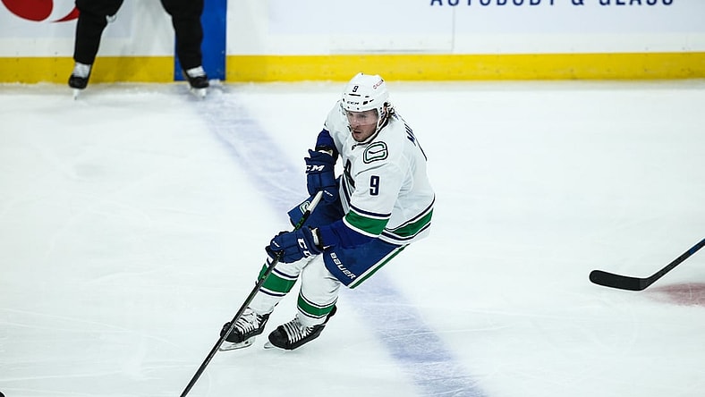 Jan 30, 2021; Winnipeg, Manitoba, CAN; Vancouver Canucks forward J.T. Miller (9) skates into the Winnipeg Jets zone duringf the second period at Bell MTS Place. Mandatory Credit: Terrence Lee-USA TODAY Sports