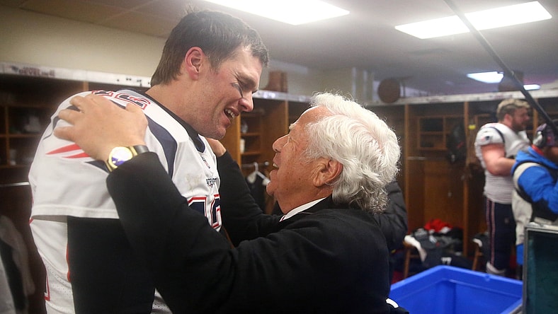 Jan 20, 2019; Kansas City, MO, USA; New England Patriots quarterback Tom Brady (12) greets owner Robert Kraft in the locker room as they celebrate their win over the Kansas City Chiefs during overtime in the AFC Championship game at Arrowhead Stadium. Mandatory Credit: Mark Rebilas-USA TODAY Sports