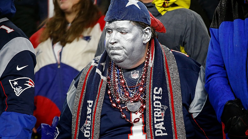 Jan 4, 2020; Foxborough, Massachusetts, USA;  A New England Patriots fan watches the end of a game against the Tennessee Titans at Gillette Stadium. Mandatory Credit: Greg M. Cooper-USA TODAY Sports