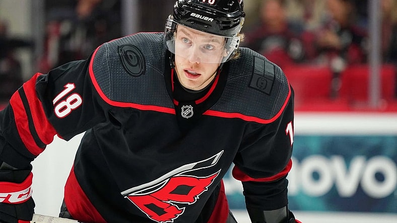 Dec 31, 2019; Raleigh, North Carolina, USA;  Carolina Hurricanes center Ryan Dzingel (18) at PNC Arena. The Carolina Hurricanes defeated the Montreal Canadiens 3-1. Mandatory Credit: James Guillory-USA TODAY Sports