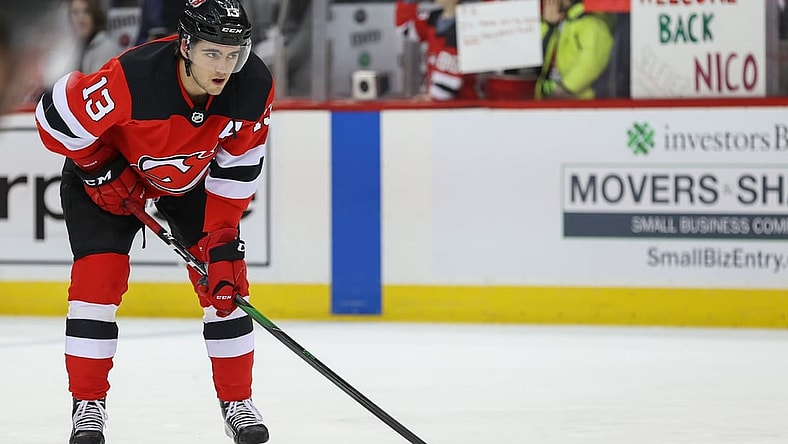 Feb 16, 2020; Newark, New Jersey, USA; New Jersey Devils center Nico Hischier (13) looks on during warmups before the start of their game against the Columbus Blue Jackets at Prudential Center. Mandatory Credit: Ed Mulholland-USA TODAY Sports