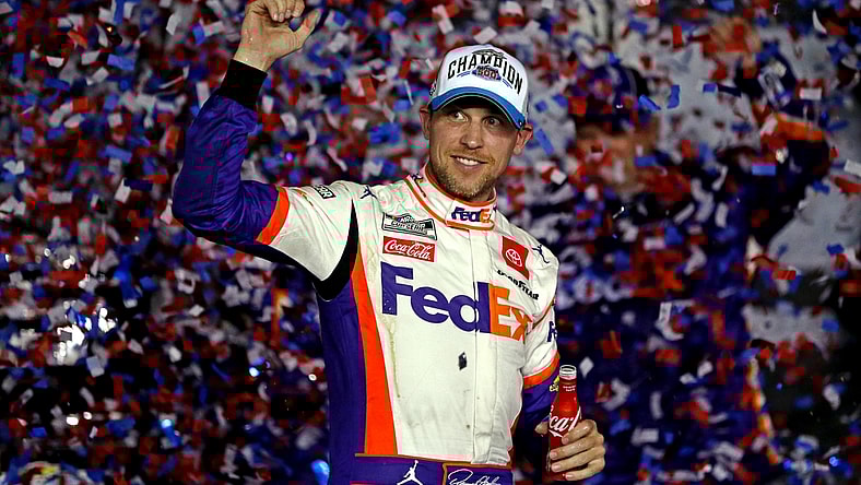 Feb 17, 2020; Daytona Beach, Florida, USA; NASCAR Cup Series driver Denny Hamlin (11) celebrates winning the Daytona 500 at Daytona International Speedway. Mandatory Credit: Peter Casey-USA TODAY Sports