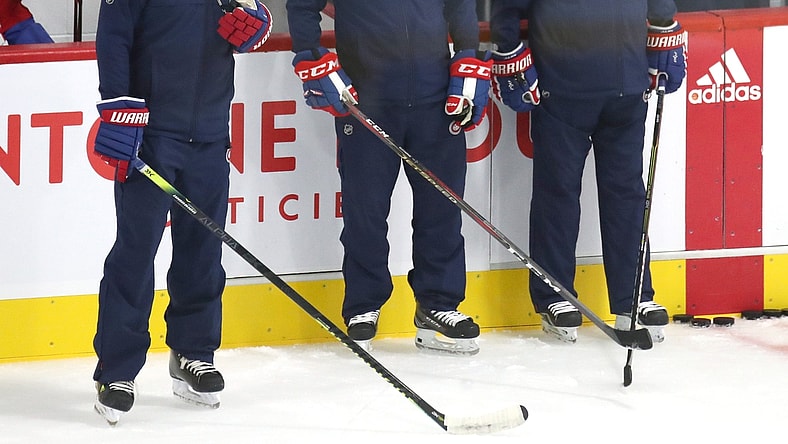 Jul 22, 2020; Montreal, Quebec, CANADA; Montreal Canadiens assistant coaches Kirk Muller (left) and Dominique Ducharme (center) and head coach Claude Julien (right) during a NHL workout at Bell Sports Complex. Mandatory Credit: Jean-Yves Ahern-USA TODAY Sports