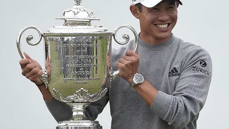 Aug 9, 2020; San Francisco, California, USA; Collin Morikawa poses with the Wanamaker Trophy after winning the 2020 PGA Championship golf tournament at TPC Harding Park. Mandatory Credit: Kelvin Kuo-USA TODAY Sports