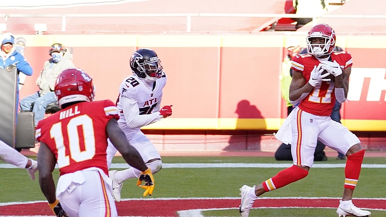 Dec 27, 2020; Kansas City, MO, USA; Kansas City Chiefs wide receiver Demarcus Robinson (11) catches a pass for a touchdown against Atlanta Falcons defensive back Kendall Sheffield (20) in the fourth quarter of a NFL game at Arrowhead Stadium. Mandatory Credit: Denny Medley-USA TODAY Sports