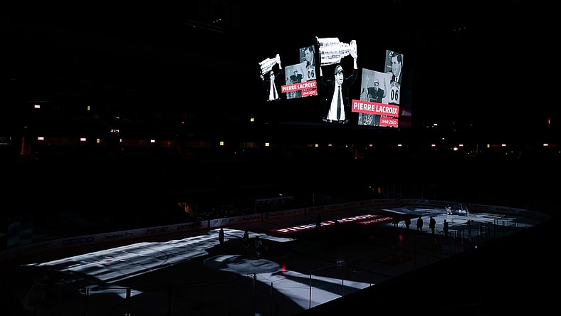Jan 13, 2021; Denver, Colorado, USA; Former Colorado Avalanche president and general manager Pierre Lacroix is honored on the scoreboard before the game against the St. Louis Blues at Ball Arena. Lacroix died on December 13, 2020 due to complications from COVID-19. Mandatory Credit: Isaiah J. Downing-USA TODAY Sports