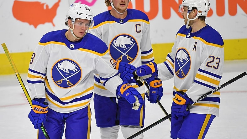 Jan 18, 2021; Philadelphia, Pennsylvania, USA; Buffalo Sabres right wing Victor Olofsson (68) celebrates his goal with center Jack Eichel (9) and center Sam Reinhart (23) against the Philadelphia Flyers during the third period at Wells Fargo Center. Mandatory Credit: Eric Hartline-USA TODAY Sports