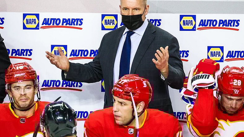 Jan 26, 2021; Calgary, Alberta, CAN; Calgary Flames head coach Geoff Ward reacts on his bench during the first period against the Toronto Maple Leafs at Scotiabank Saddledome. Mandatory Credit: Sergei Belski-USA TODAY Sports