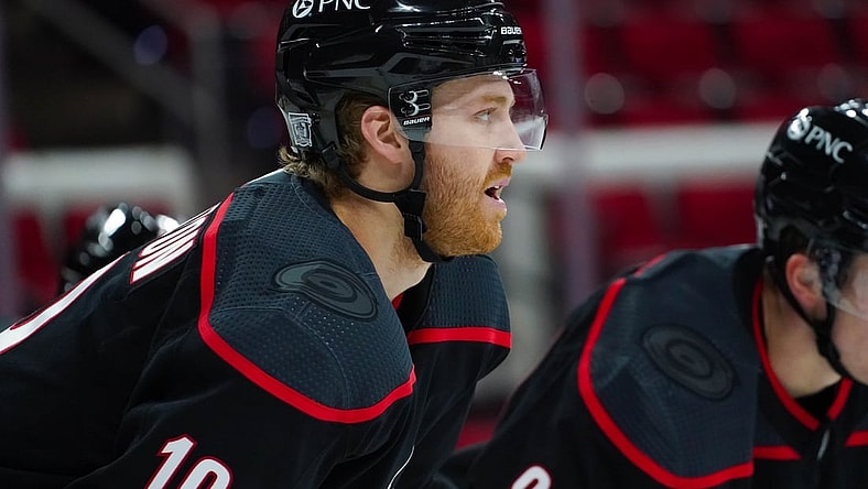 Jan 28, 2021; Raleigh, North Carolina, USA;  Carolina Hurricanes defenseman Dougie Hamilton (19) looks on against the Tampa Bay Lightning  at PNC Arena. Mandatory Credit: James Guillory-USA TODAY Sports