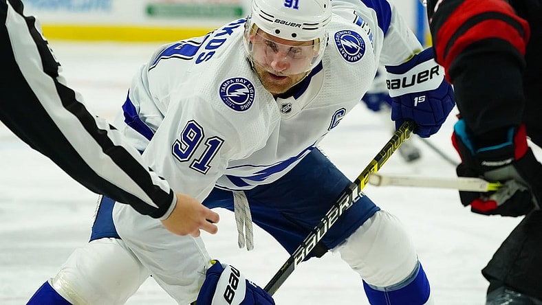 Jan 28, 2021; Raleigh, North Carolina, USA;  Tampa Bay Lightning center Steven Stamkos (91) gets ready to take a face off against the Carolina Hurricanes at PNC Arena. Mandatory Credit: James Guillory-USA TODAY Sports