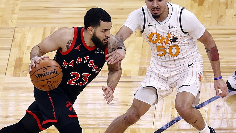 Feb 2, 2021; Orlando, Florida, USA; Toronto Raptors guard Fred VanVleet (23) drives to the basket as Orlando Magic guard Cole Anthony (50) defends during the first quarter at Amway Center. Mandatory Credit: Kim Klement-USA TODAY Sports